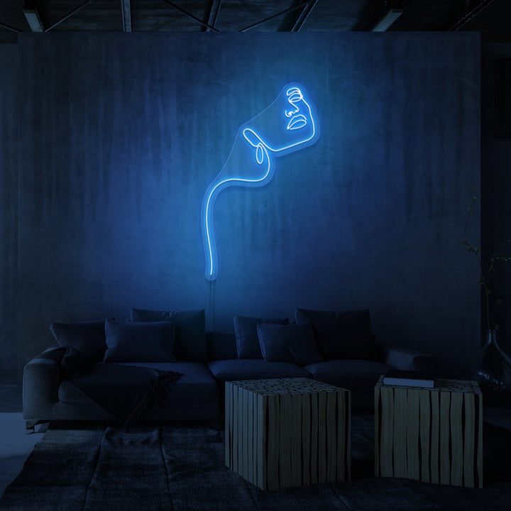 Leuchtreklame „LINE ART LADY“.