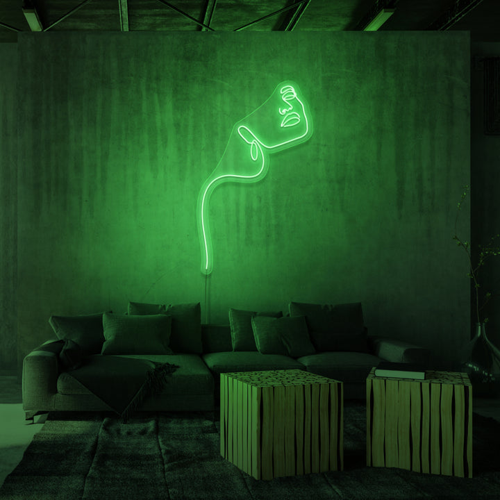 Leuchtreklame „LINE ART LADY“.