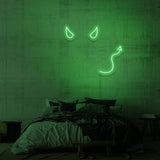 Leuchtreklame „Teufel“.