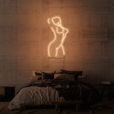 Leuchtreklame „Weiblich“.