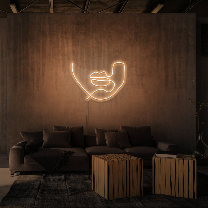 Neonschild „Line Art Lips“.