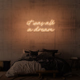 Leuchtreklame „ES WAR ALLES EIN TRAUM“.