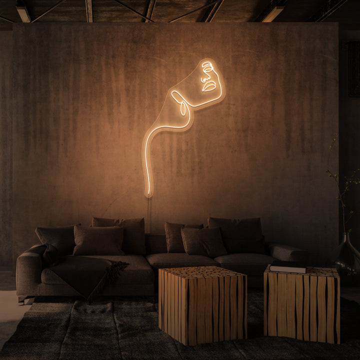 Leuchtreklame „LINE ART LADY“.