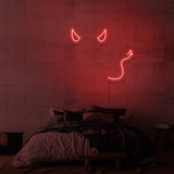 Leuchtreklame „Teufel“.