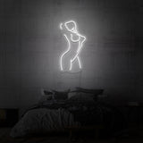 Leuchtreklame „Weiblich“.