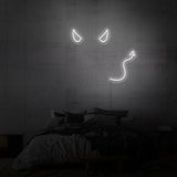 Leuchtreklame „Teufel“.