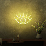 Mini-Leuchtreklame „EYE“.