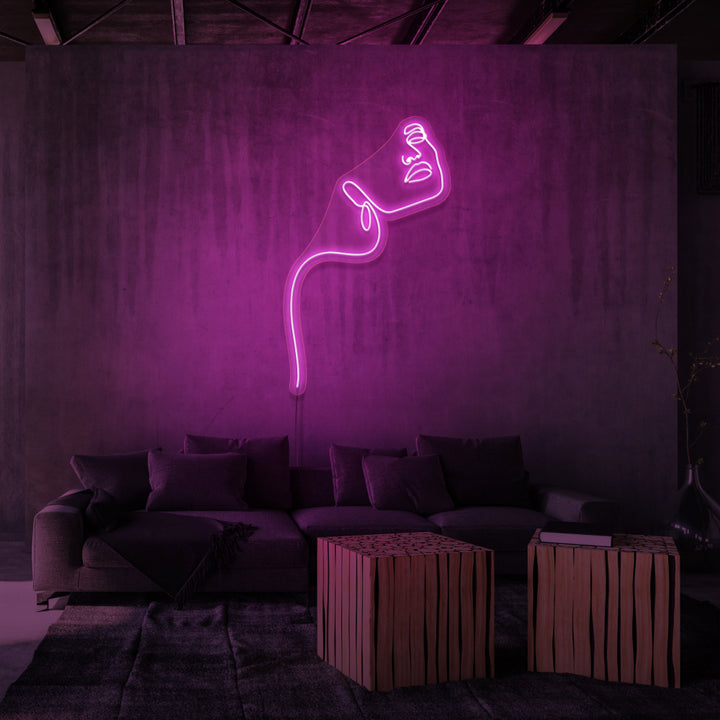 Leuchtreklame „LINE ART LADY“. 
