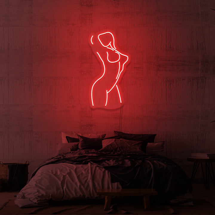 Leuchtreklame „Weiblich“. 