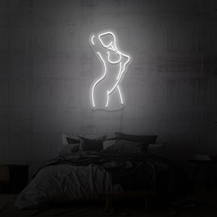 Leuchtreklame „Weiblich“. 